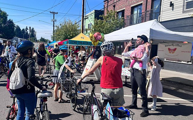 Portland, OR - The author attempting to juggle inspiration and administration in the days leading up to Rosh Hashanah (compliments). Portland, OR - The author attempting to juggle inspiration and administration in the days leading up to Rosh Hashanah (compliments).