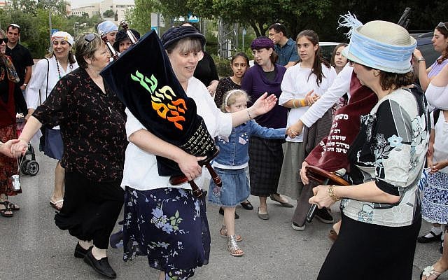 Jewish Religious women dance in celebration of a new Torah scroll brought to a synagogue in the Rimon neighborhood of Efrat, West Bank. April 26, 2010. (Gershon Elinson/FLASH90)