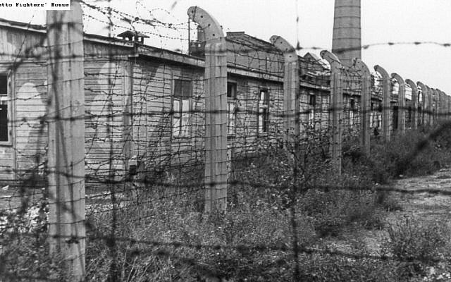 A barbed wire fence and barracks in the "Hasag Pelcery" labor camp in Czestochowa (via Ghetto Fighters House Archives) A barbed wire fence and barracks in the "Hasag Pelcery" labor camp in Czestochowa (via Ghetto Fighters House Archives)