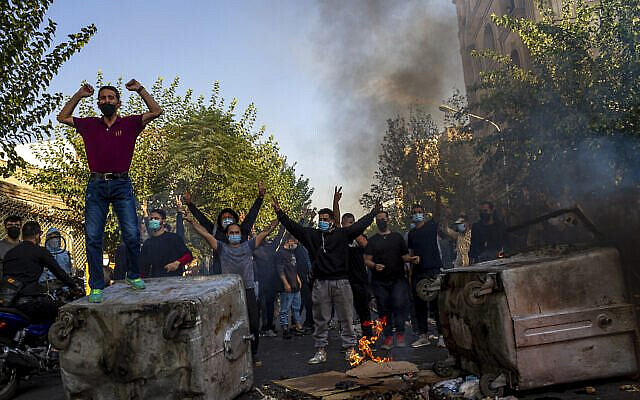 Iranians protest the death of 22-year-old Mahsa Amini after she was detained by the morality police in Tehran, October 27, 2022. (Photo taken by an individual not employed by the Associated Press and obtained by the AP outside Iran, Middle East Images/AP) Iranians protest the death of 22-year-old Mahsa Amini after she was detained by the morality police in Tehran, October 27, 2022. (Photo taken by an individual not employed by the Associated Press and obtained by the AP outside Iran, Middle East Images/AP)