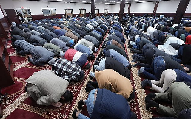 Men pray at the Islamic Center of Detroit in Detroit, Jan. 26, 2024. (AP Photo/Paul Sancya)