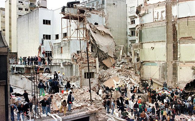 Rescue workers search for survivors and victims in the rubble after a powerful car bomb destroyed the Buenos Aires headquarters of the Argentine Israelite Mutual Association (AMIA), in this July 18, 1994 file photo. REUTERS/Files/Enrique Marcarian Rescue workers search for survivors and victims in the rubble after a powerful car bomb destroyed the Buenos Aires headquarters of the Argentine Israelite Mutual Association (AMIA), in this July 18, 1994 file photo. REUTERS/Files/Enrique Marcarian