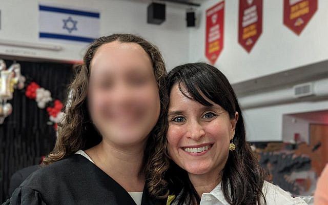 The author with her daughter at her 2024 high school graduation