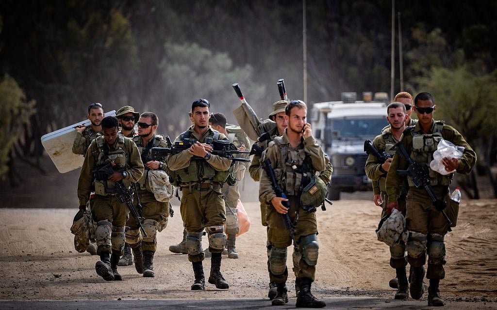 IDF soldiers seen near the Israeli border with the Gaza Strip, October 6, 2024. (Yonatan Sindel/Flash90)