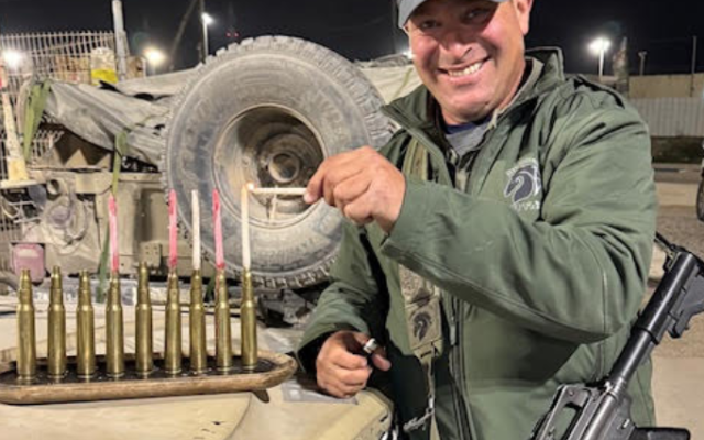 Lighting my IDF "Heavy Metal" Menorah in Gaza this year on Hannukah.  Photo ©️ T. Book, 2025