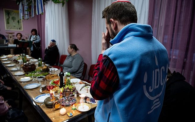 The author lights Shabbat candles at Hesed Besht in Rivne, Ukraine — a social service center and humanitarian hub operated by his organization, the American Jewish Joint Distribution Committee (JDC). Photo: Arik Shraga The author lights Shabbat candles at Hesed Besht in Rivne, Ukraine — a social service center and humanitarian hub operated by his organization, the American Jewish Joint Distribution Committee (JDC). Photo: Arik Shraga