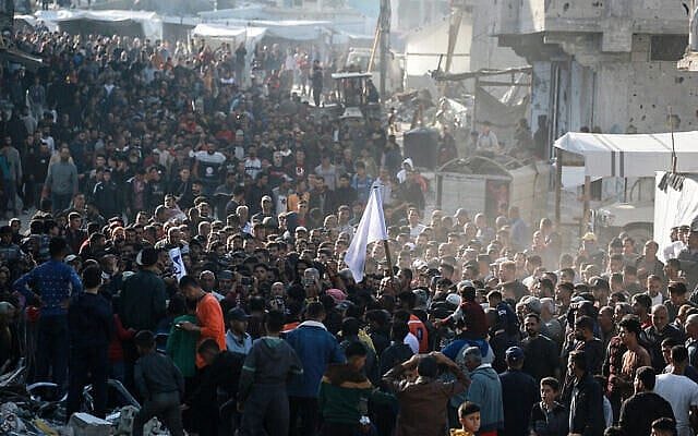 Palestinians take part in an anti-Hamas protest, calling for an end to the war with Israel, in Beit Lahiya in the northern Gaza Strip on March 26, 2025. (Times of Israel/AFP) Palestinians take part in an anti-Hamas protest, calling for an end to the war with Israel, in Beit Lahiya in the northern Gaza Strip on March 26, 2025. (Times of Israel/AFP)