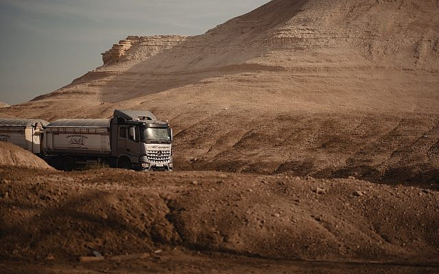 A truck with license plates issued by the Palestinian Authority travels into Area C, under co-administration by the PA and Israel. Photo by the author. A truck with license plates issued by the Palestinian Authority travels into Area C, under co-administration by the PA and Israel. Photo by the author.