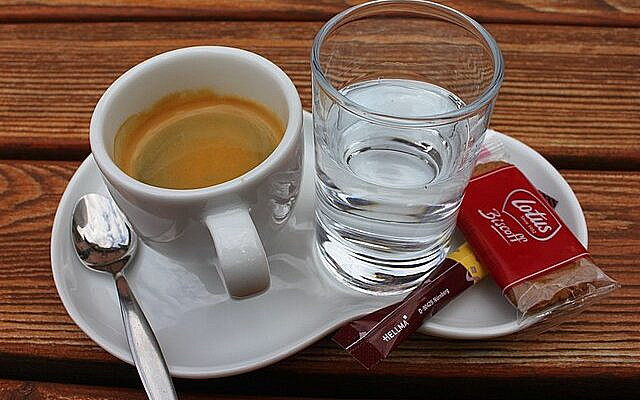Espresso, soda, cookie, and finding the helpers. Wikimedia Commons. Used with permission.