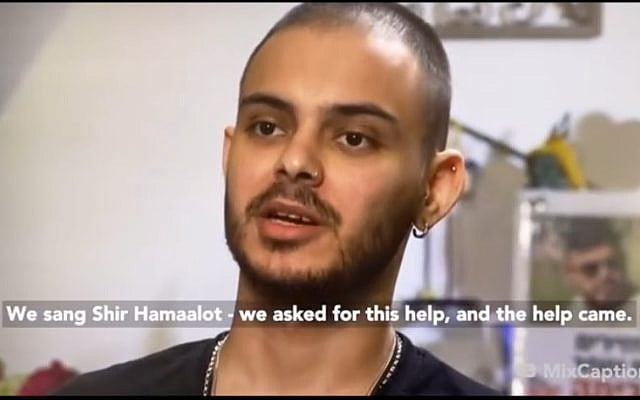 Omer Wenkert describing singing Shir HaMaalot in Captivity (Credit: MeaningfulMinute/Instagram)