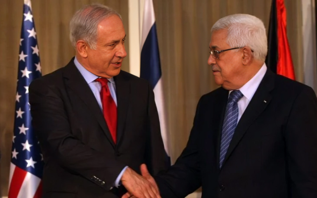Israel's Prime Minister Benjamin Netanyahu with PLO President Mahmoud Abbas (Kobi Gideon/Flash90)