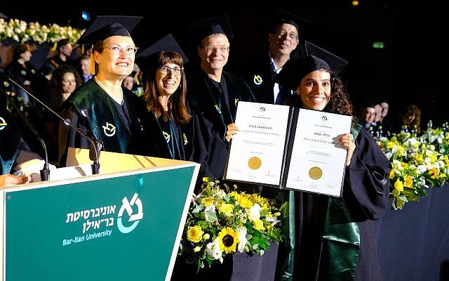 A female student receives her PhD from Bar-Ilan University. Photo courtesy of Bar-Ilan University.