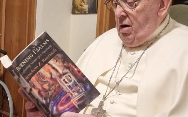 Pope Francis is seen in an undated photo reading "Burning Psalms: Confronting Adonai after Auschwitz" (Ben Yehuda Press) by Menachem Z. Rosensaft. (OSV News photo/courtesy Menachem Z. Rosensaft) Pope Francis is seen in an undated photo reading "Burning Psalms: Confronting Adonai after Auschwitz" (Ben Yehuda Press) by Menachem Z. Rosensaft. (OSV News photo/courtesy Menachem Z. Rosensaft)