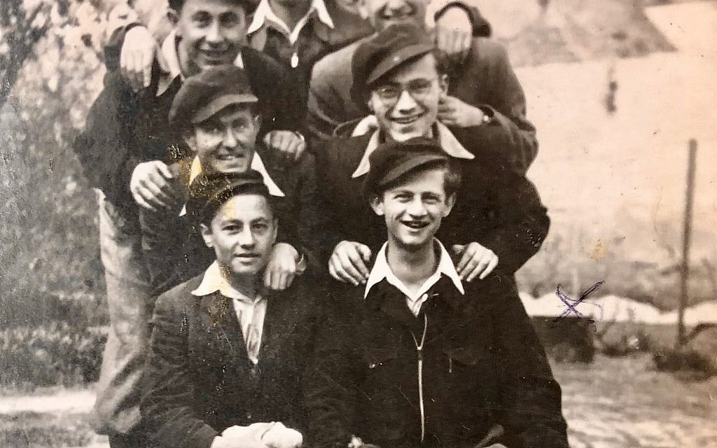 My father (bottom left) with other members of the Jewish underground in Bucharest (1944)
