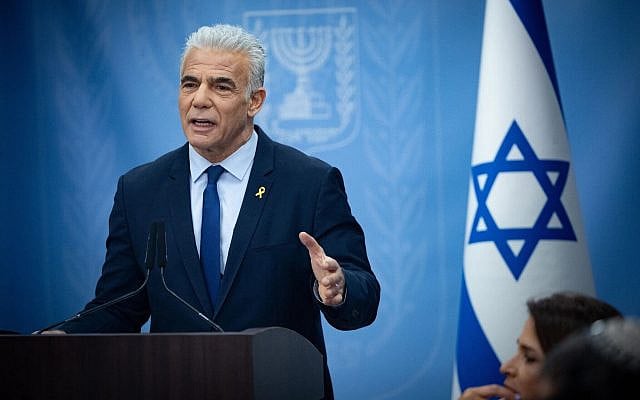 Opposition Leader Yair Lapid leads a Yesh Atid faction meeting at the Knesset, in Jerusalem, on July 22, 2024. (Yonatan Sindel/Flash90)