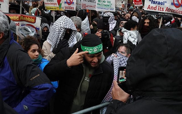 An anti-Israel protester wearing a Hamas headband outside the NYU Langone Medical Center in New York City, January 6, 2025. (Luke Tress/Times of Israel) An anti-Israel protester wearing a Hamas headband outside the NYU Langone Medical Center in New York City, January 6, 2025. (Luke Tress/Times of Israel)