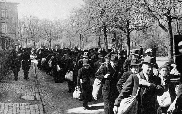 Jews deported from Würzburg march down the Hindenburgstrasse from the Platzscher Garten to the railroad station (PD via Wikimedia Commons)