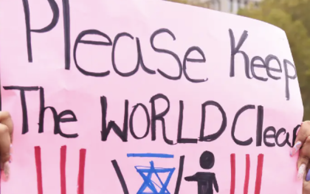 An antisemitic sign at a pro-Palestinian protest of NYU students and others in Manhattan's Washington Square Park on October 25, 2023. (Screen capture/X) An antisemitic sign at a pro-Palestinian protest of NYU students and others in Manhattan's Washington Square Park on October 25, 2023. (Screen capture/X)