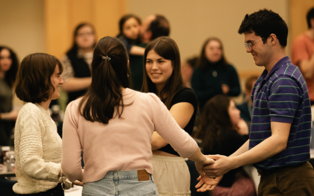 Photo of students dancing as the Seder concludes. Courtesy of Hillel at UVM.