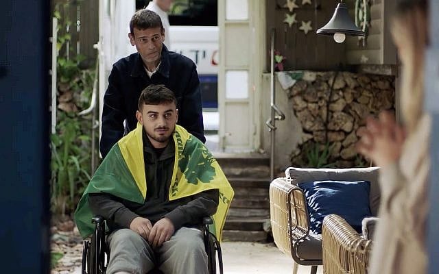Injured veteran returns home for Passover seder in Yad Sarah wheelchair - Credit: Reuveni Pridan - Courtesy of Yad Sarah. Injured veteran returns home for Passover seder in Yad Sarah wheelchair - Credit: Reuveni Pridan - Courtesy of Yad Sarah.