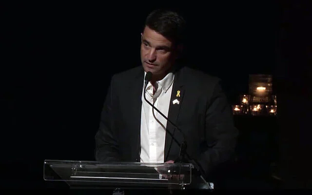 Hod Hasharon Mayor Amir Kochavi speaks at the city's ceremony for the onset of Holocaust Remembrance Day, April 23, 2025. (Screen capture via Facebook)