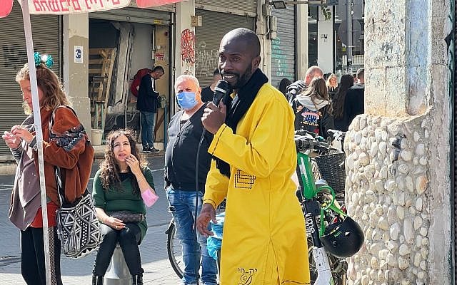 Yokai Ben Israel Edwards performs at the Jaffa Flea Market in 2022. (Andrew Esensten)