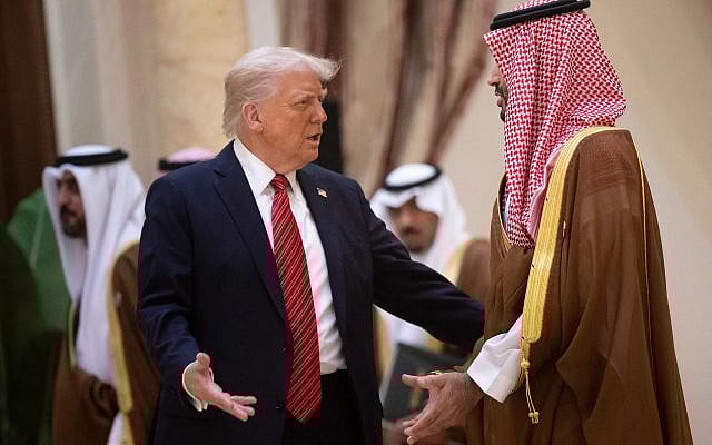 US President Donald Trump speaks with Saudi Crown Prince Mohammed bin Salman before posing for a family picture with Gulf leaders during a gathering of the six-nation Gulf Cooperation Council (GCC) in Riyadh on May 14, 2025. (Brendan Smialowski / AFP)