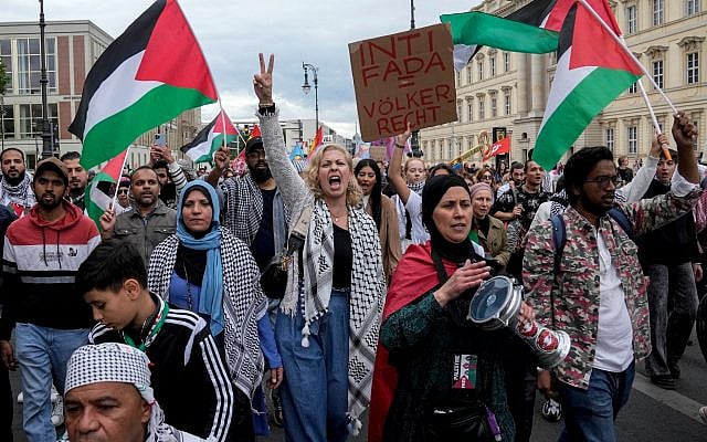People take part in an anti-Israel and pro-Palestinian rally in Berlin, May 18, 2024. (AP Photo/Ebrahim Noroozi)