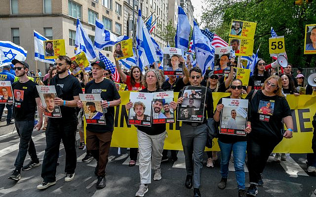 Families of hostages and Hamas captivity survivors marching for the hostages in NYC's Israel Parade on May 18, 2025 (Liri Agami)