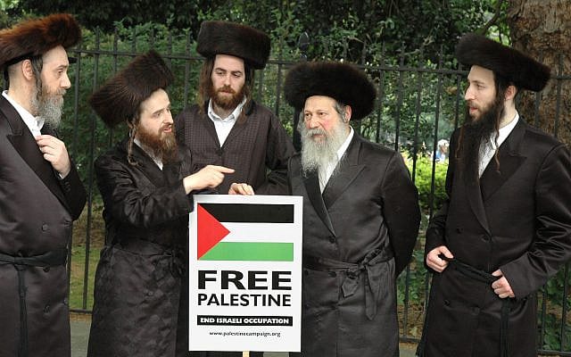 Photo Credits: https://commons.wikimedia.org/wiki/File:Members_of_Neturei_Karta_Orthodox_Jewish_group_protest_against_Israel.jpg