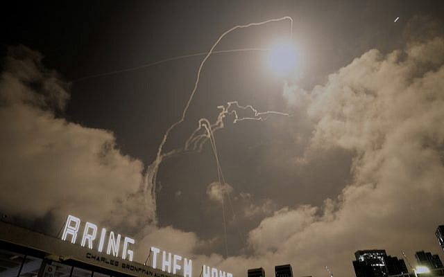 A missile fired from Iran is intercepted by Israel's air defense system over Tel Aviv, Israel, early Sunday, June 15, 2025. (AP Photo/Baz Ratner)
