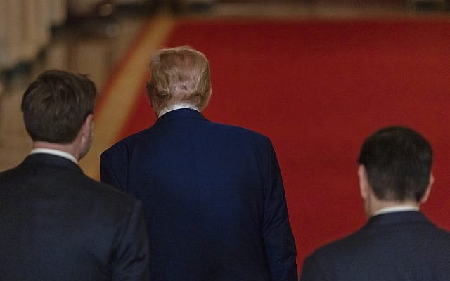 President Donald Trump departs after speaking from the East Room of the White House in Washington, Saturday, June 21, 2025, after the U.S. military struck three Iranian nuclear and military sites, directly joining Israel's effort to decapitate the country's nuclear program. (Carlos Barria/Pool via AP)