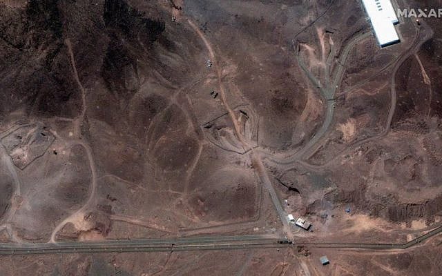 Satellite imagery of Iran’s Fordo nuclear site shows heavy equipment already operating at the facility. Image courtesy of Maxar