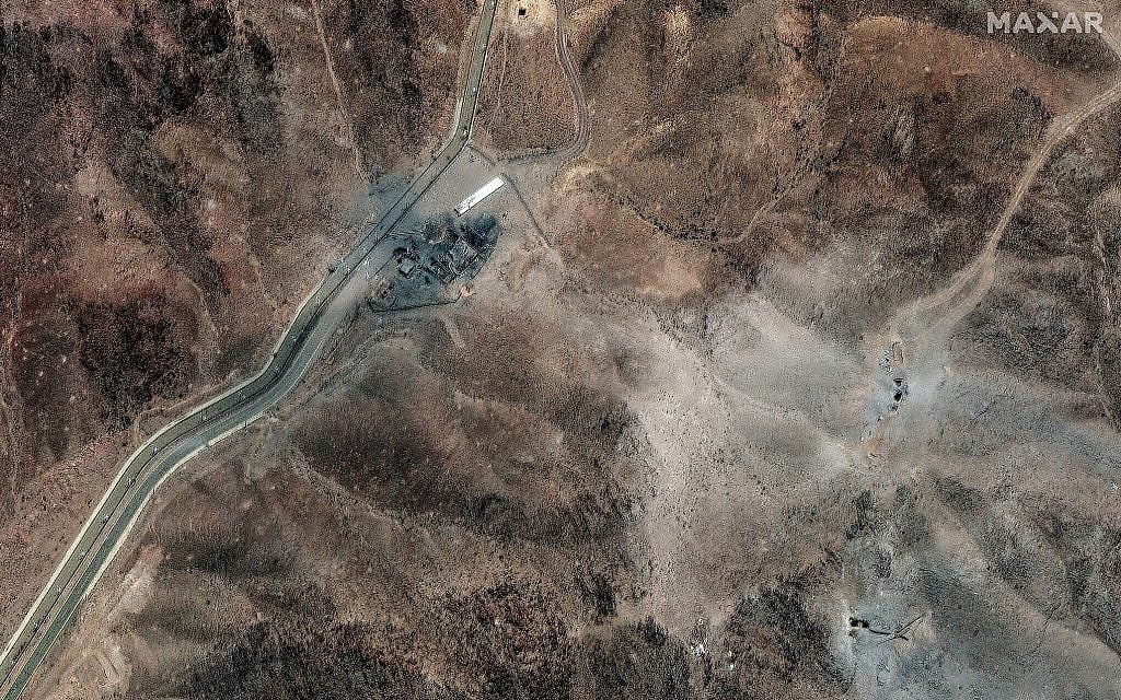 This handout satellite picture provided by Maxar Technologies and taken on June 24, 2025, shows new airstrike craters at a perimeter installation on Iran's Fordo nuclear facility, northeast of the city of Qom. (Satellite image ©2025 Maxar Technologies/AFP)