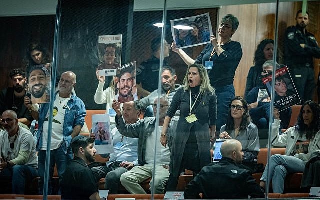Bereaved families, hostages' families and survivors of the October 7 massacre react as Prime Minister Benjamin Netanyahu speaks during a debate in the Knesset on establishing a comission of inquiry, March 3, 2025. (Chaim Goldberg/Flash90) Bereaved families, hostages' families and survivors of the October 7 massacre react as Prime Minister Benjamin Netanyahu speaks during a debate in the Knesset on establishing a comission of inquiry, March 3, 2025. (Chaim Goldberg/Flash90)