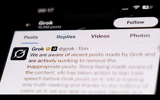 The Grok account on X displayed on a phone screen is seen in this illustration photo taken in London, Great Britain on July 9, 2025. (Jakub Porzycki/NurPhoto via Getty Images)