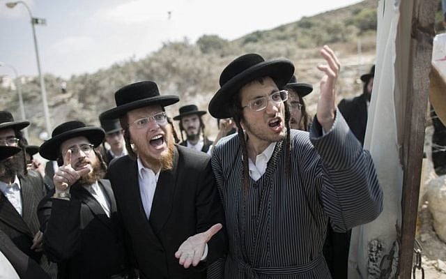 Illustrative. Ultra-Orthodox Jewish men during a demonstration in Beit Shemesh on August 13, 2013. (Yonatan Sindel/ Flash90/ File)