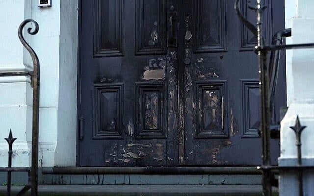 Damage to the exterior of the East Melbourne Hebrew Congregation in Melbourne is seen on an Australian Broadcasting Corporation news report on July 5, 2025, following an arson attack the previous day (TOI c/o Australian Broadcasting Corporation)