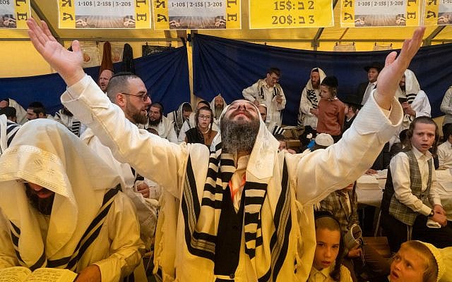 Orthodox Jews pray at the tomb of Rabbi Nachman, the great grandson of the founder of Hasidic movement, in the town of Uman, Ukraine, Thursday, Oct. 3, 2024. (AP Photo/Efrem Lukatsky)