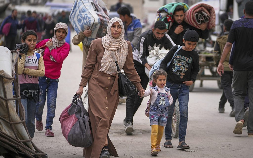 Displaced Palestinians flee from east to west of Gaza City after the IDF issued evacuation orders in the area, Friday April 11, 2025. (AP Photo/Jehad Alshrafi)