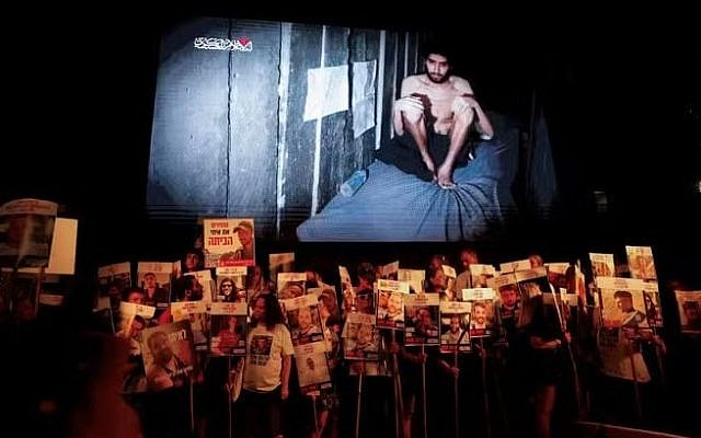 Hamas’s video of hostage Evaytar David screened at a rally organized by the “Hostages and Missing Families Forum” (Ammar Awad/Reuters).