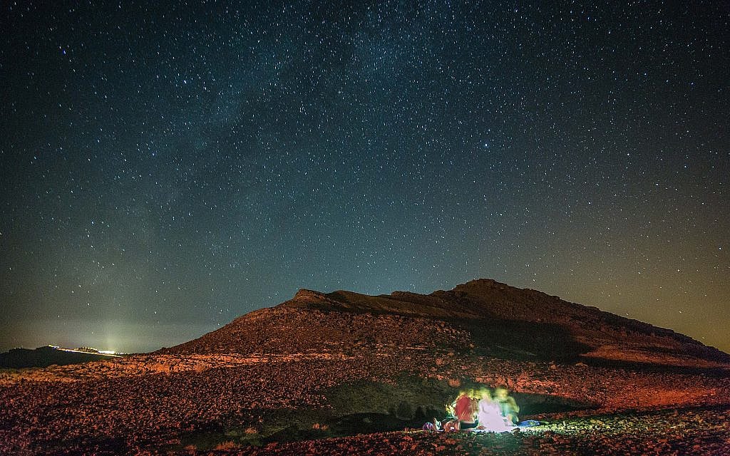 'I trust the one who lay under the desert sky with me.': (View of the stars during a meteor shower in the skies above the Negev desert, near Ramon Lookout, in southern Israel, on August 12, 2016. PHOTO: Edi Israel/Flash90) 'I trust the one who lay under the desert sky with me.': (View of the stars during a meteor shower in the skies above the Negev desert, near Ramon Lookout, in southern Israel, on August 12, 2016. PHOTO: Edi Israel/Flash90)