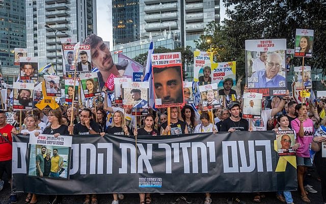 Families of hostages held in the Gaza Strip and supporters march to Hostage Square in Tel Aviv, to a rally calling for the release of hostages held in Gaza, August 17, 2025. (Chaim Goldberg/Flash90)