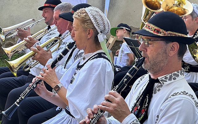 Musicians in a traditional German brass band entertain guests at the 13th annual Haferland Festival in Buneşti, a Saxon village in the Transylvania region of Romania. (Photo by Larry Luxner)