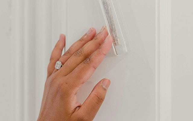 https://www.pexels.com/photo/hand-with-ring-9241910/