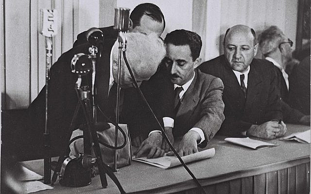 Government Press Office (GPO) - Ben Gurion (Left) Signing the Declaration of Independence (Wikimedia Commons)