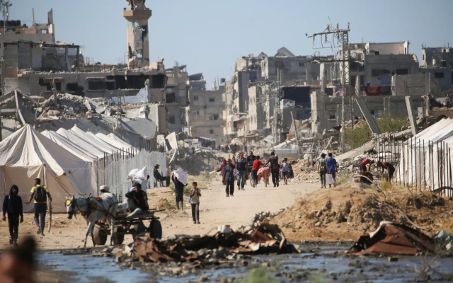 Gazans in the war-destroyed area. AFP via Gettyimage