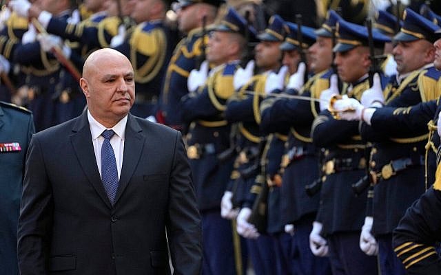 Newly-elected Lebanese President Joseph Aoun reviews the honor guard upon his arrival at the Lebanese Parliament to be sworn in as a new president, in Beirut, Lebanon, January 9, 2025. (AP Photo/Hussein Malla)