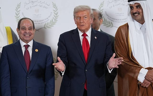 President Donald Trump stands next to Qatar Prime Minister and Foreign Minister Sheikh Mohammed bin Abdulrahman bin Jassim Al Thani and Egypt's President Abdel-Fattah el-Sissi during a summit to support ending the more than two-year Israel-Hamas war in Gaza after a breakthrough ceasefire deal on Oct. 13, 2025, in Sharm El Sheikh, Egypt. (AP Photo/Evan Vucci, Pool)