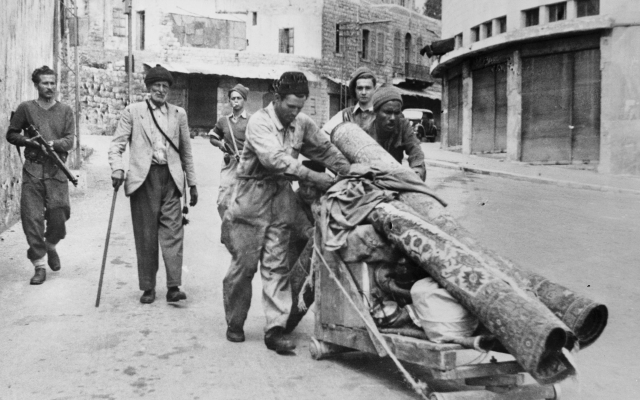 In April 1948, armed Haganah forces drove Arab residents out of Haifa – a haunting snapshot from the days when terror became the foundation of a nation, when the birth of a state was written in bombs and silence, and when Israel began forgetting what it once was. (Wikipedia) In April 1948, armed Haganah forces drove Arab residents out of Haifa – a haunting snapshot from the days when terror became the foundation of a nation, when the birth of a state was written in bombs and silence, and when Israel began forgetting what it once was. (Wikipedia)